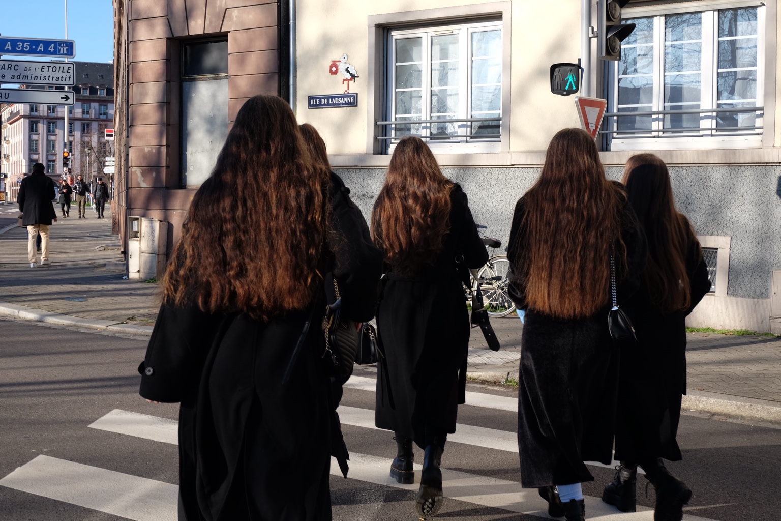 Group crossing a street in Lausanne